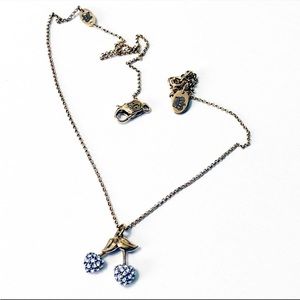 Juicy Couture cherry necklace, in new condition.